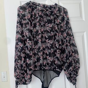 Bodysuit never used. Original. Beautiful and sexy.